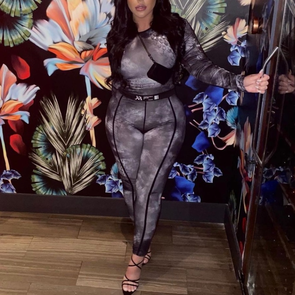 JK Attire. Size L. Snake Print Jumpsuit.